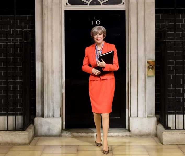 Theresa May's wax figure is seen on the Madame Tussauds London Downing Street set.