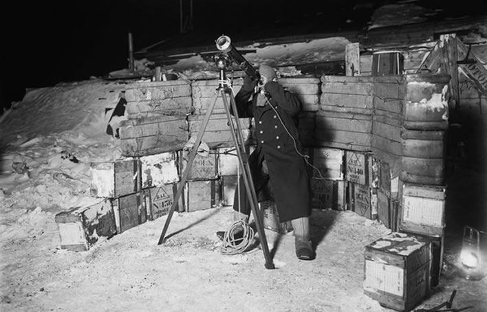 Terra Nova expedition: Teddy Evans looking through a telescope.