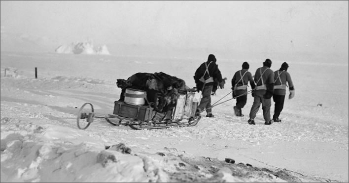 Terra Nova expedition: A four man sledge team manhauling.