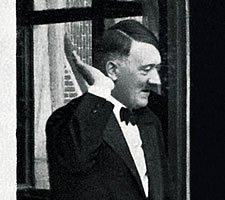 Adolf Hitler in 1937 greeting the crowds from a window in Bayreuth (detail). Image: NZZ/Heritage Images.
