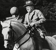 Churchill riding his horse Salve in the grounds of Chartwell, ND (detail).