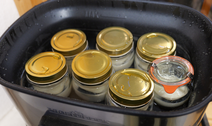 The sous-vide machine, filled with jars and pre-heated water, ready to roll for 12 hours.