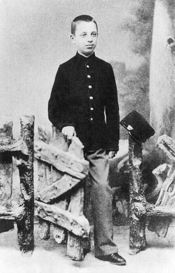 René Rilke in school uniform, ND.